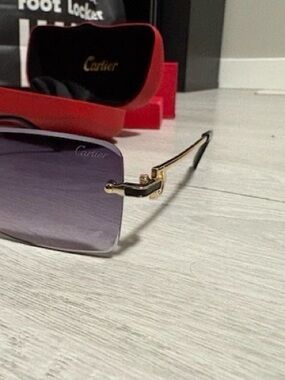 Cartier Women's Rimless Sunglasses with Purple Gradient Lenses and Gold Temples
